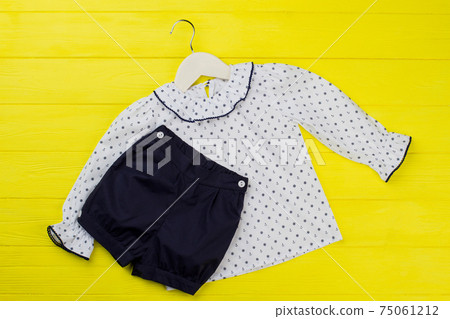 Blouse and shirt on yellow Blouse and shirt on yellow 75061212