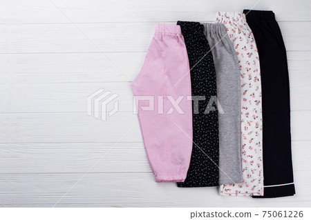 Pile of girls' pants 75061226