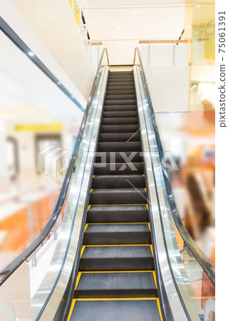 Escalator in business center 75061391