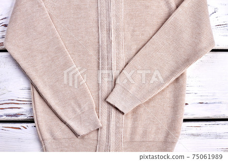 Cropped image of warm knitted sweater. 75061989