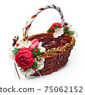 Festive basket with a flower arrangement on white background 75062152