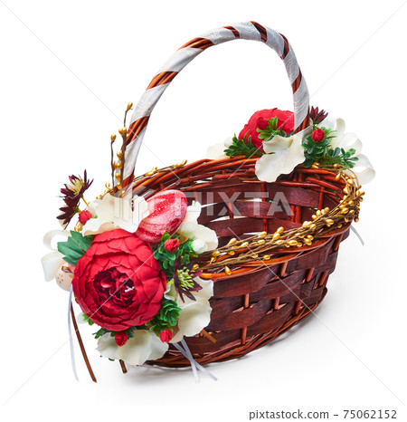 Festive basket with a flower arrangement on white background Festive basket with a flower arrangement on white background 75062152