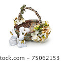 Easter basket from a flower arrangement and a rabbits on white background 75062153
