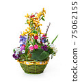 Easter basket from a flower arrangement on white background 75062155