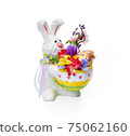 Easter bunny with flower arrangement on a white background 75062160