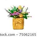 Easter basket from a flower arrangement on white background 75062165