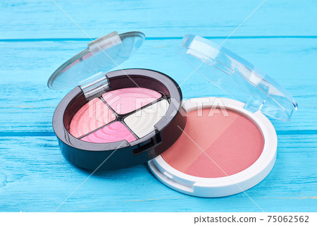 Pink eyeshadows and blusher close up. Pink eyeshadows and blusher close up. 75062562