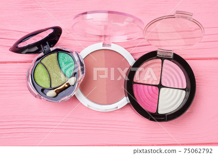 Eyeshadows set on pink background. 75062792