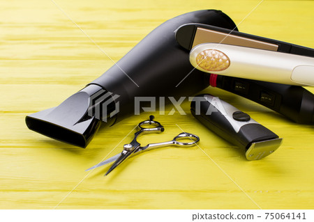 Hairdresser tools on color background. 75064141