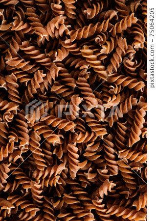 Whole grain pasta for the whole background. 75064205
