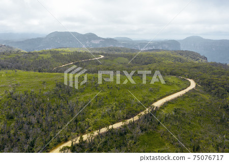 Aerial view of a dirt track in the Grose Valley in The Blue Mountains in Australia 75076717