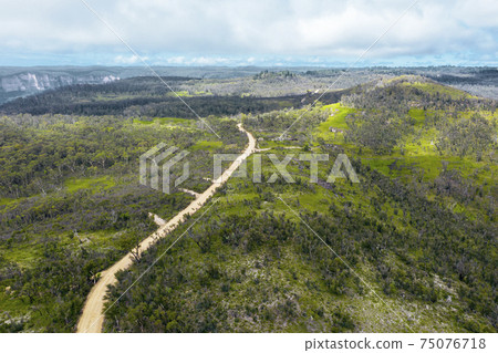 Aerial view of a dirt track in the Grose Valley in The Blue Mountains in Australia 75076718