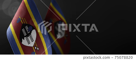 Small national flags of the Swaziland on a dark background Small national flags of the Swaziland on a dark background 75078820