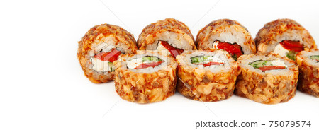 Sushi Roll with fried salmon in Teriyaki sauce on a white plate, ingredients Fried salmon, cream Sushi Roll with fried salmon in Teriyaki sauce on a white plate, ingredients Fried salmon, cream 75079574