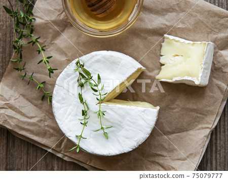 Camembert cheese with snacks Camembert cheese with snacks 75079777