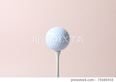 Pink background tee and golf ball 75080458