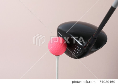 Pink background tee and golf ball Pink background tee and golf ball 75080460