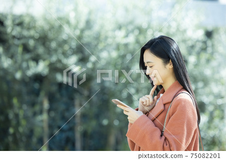 Woman in coat Woman in coat 75082201