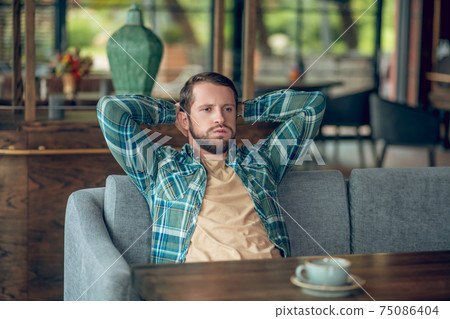 Dissatisfied man tired of long waiting 75086404