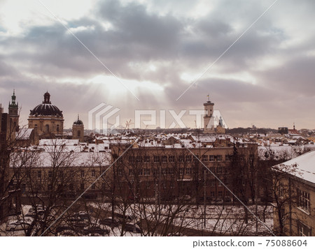 Lviv City in the evening. Central part of the old town of Lvov, cultural tourism center of Ukraine.Old historic building 75088604