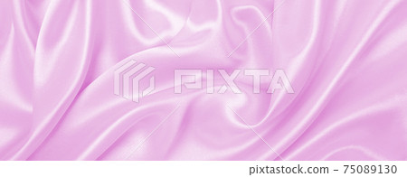 Smooth elegant pink silk or satin texture as wedding background. Luxurious background design Smooth elegant pink silk or satin texture as wedding background. Luxurious background design 75089130