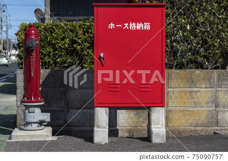 Outdoor fire hydrant on the street corner Outdoor fire hydrant on the street corner 75090757