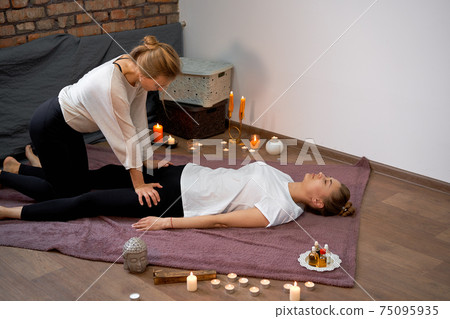 Relax and enjoy in spa salon, getting thai massage by professional masseur. 75095935