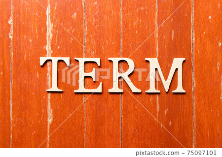 Alphabet letter in word term on old red color wood plate background 75097101