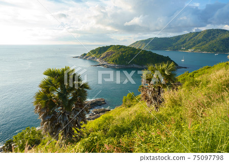 Tourists at Phromthep cape viewpoint at the south of Phuket Island, Thailand. Tropical paradise in Thailand. Phuket is a popular destination famous for tourists 75097798