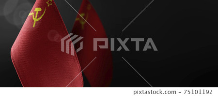 Small national flags of the USSR on a dark background Small national flags of the USSR on a dark background 75101192