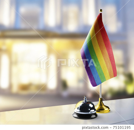 lgbt flag on the reception desk in the lobby of the hotel lgbt flag on the reception desk in the lobby of the hotel 75101195