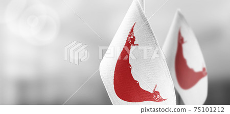 Small national flags of the Easter Island on a light blurry background Small national flags of the Easter Island on a light blurry background 75101212