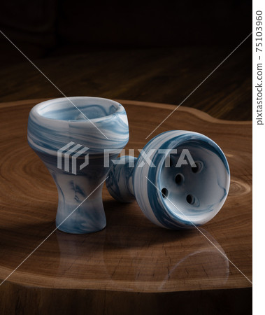 part of the hookah, modern design, on a background. part of the hookah, modern design, on a background. 75103960