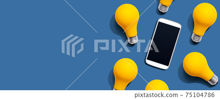 Smartphone with yellow light bulbs 75104786