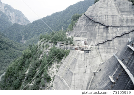 Concrete-solidified mountains on the opposite bank of Kurobe Dam, Tateyama, Japan Concrete-solidified mountains on the opposite bank of Kurobe Dam, Tateyama, Japan 75105959