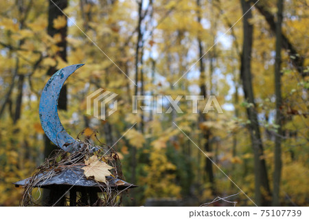 Old islamic cemetery, funeral and burial of muslim. A grave with iron crescent moon. Metal gravestone 75107739