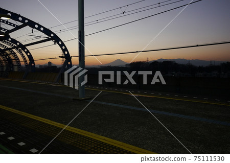 Mt. Fuji Schriette from a train running at high speed Mt. Fuji Schriette from a train running at high speed 75111530