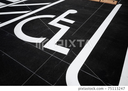 Wheelchair mark in the parking lot Compassionate parking lot Securing parking space for people with disabilities b-2 High contrast 75113247