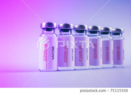 Toned image of COVID-19 vaccine vials against purple background with copy space for text - coronavirus vaccine doses, global vaccination concept. Selective focus Toned image of COVID-19 vaccine vials against purple background with copy space for text - coronavirus vaccine doses, global vaccination concept. Selective focus 75115508