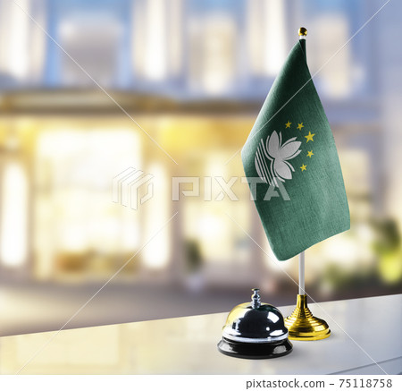 Macao flag on the reception desk in the lobby of the hotel Macao flag on the reception desk in the lobby of the hotel 75118758