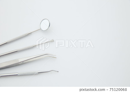 Basic dentist tools isolated on white background. Dental health and teethcare concept Basic dentist tools isolated on white background. Dental health and teethcare concept 75120068