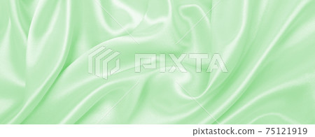Smooth elegant green silk or satin luxury cloth texture as abstract background. Luxurious background design 75121919