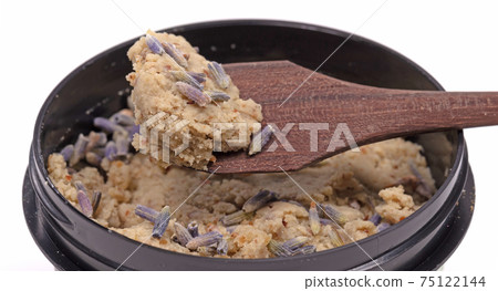 Special lavender bath salt with wooden spoon, isolated Special lavender bath salt with wooden spoon, isolated 75122144