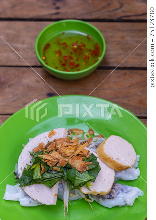 Traditional Vietnamese breakfast - Banh Cuon, rice noodle rolls Traditional Vietnamese breakfast - Banh Cuon, rice noodle rolls 75123780