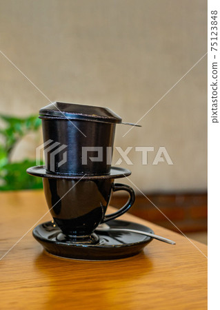 Vietnam traditional styled coffee dripping filter in black color Vietnam traditional styled coffee dripping filter in black color 75123848