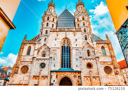 Facade of St. Stephen's Cathedral (more commonly known by its German title: Stephansdom) is the mother church of the Roman Catholic Archdiocese of Vienna. Austria. 75126210