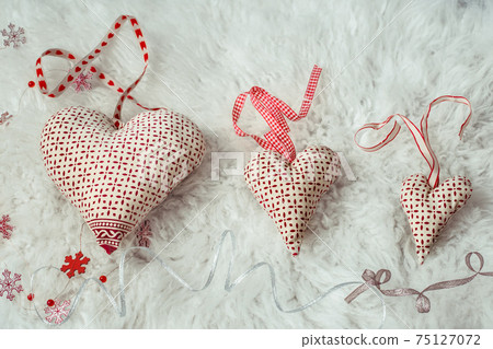 Hearts made of handmade fabric, top view, flat lay. Hearts made of handmade fabric, top view, flat lay. 75127072