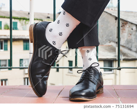 Men's legs, trendy shoes and bright socks Men's legs, trendy shoes and bright socks 75131694