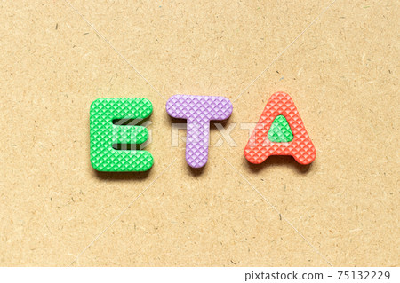 Foam alphabet letter in word ETA (abbreviation of estimated time of arrival) on wood background Foam alphabet letter in word ETA (abbreviation of estimated time of arrival) on wood background 75132229