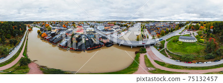 Porvoo, Finland - 2 October 2019: Panoramic aerial autumn view of old town of Porvoo, Finland. Porvoo, Finland - 2 October 2019: Panoramic aerial autumn view of old town of Porvoo, Finland. 75132457